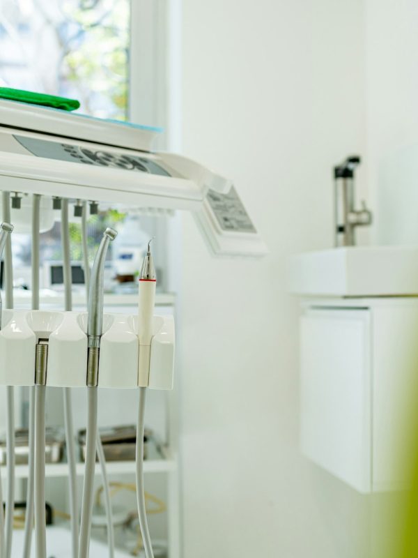 Detail of a dental tools attached to a dental chair in a dental clinic